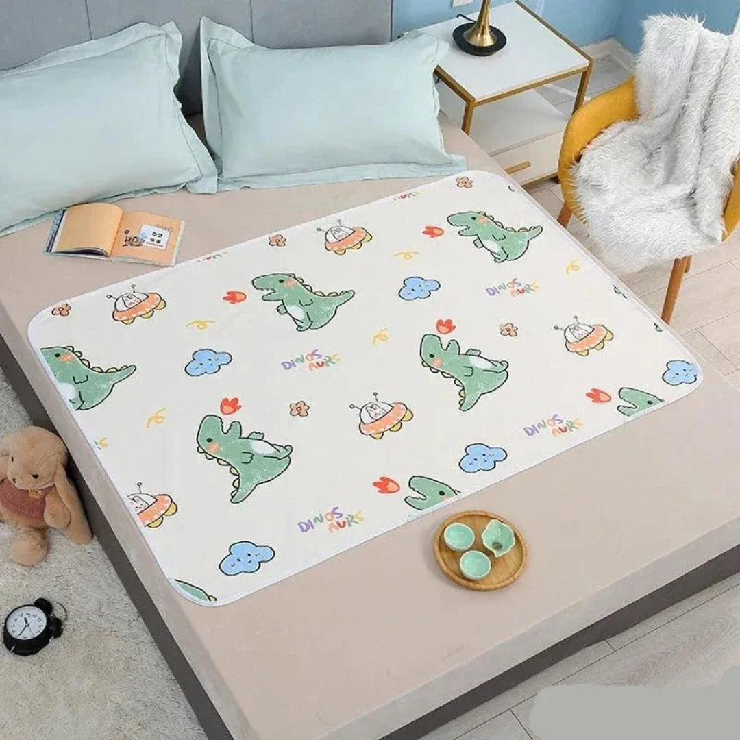 SnugglyNest – Wasserdichte Wickelunterlage für Kinder ab 0+ – Hält das Bett Trocken