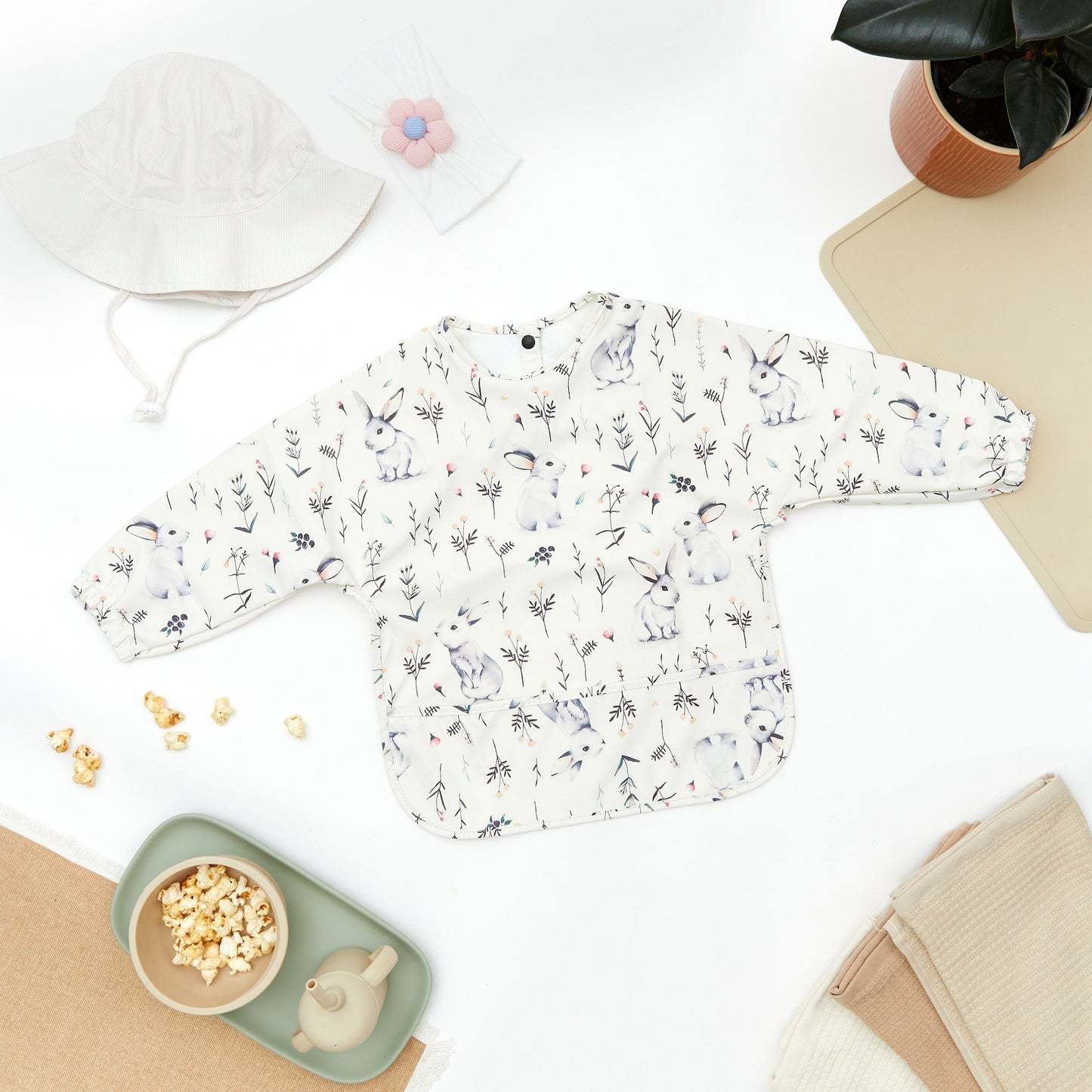 Waterdichte babyslab met lange mouwen en bloemenprint