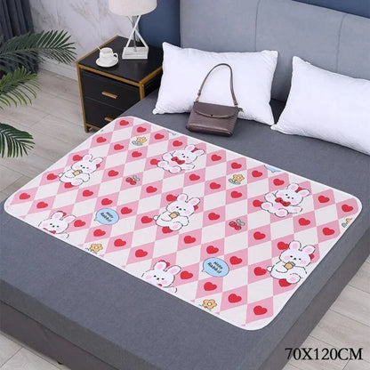 SnugglyNest – Wasserdichte Wickelunterlage für Kinder ab 0+ – Hält das Bett Trocken