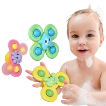 BabySpinner - Buntes Twist-Spielzeug im Saugnapf