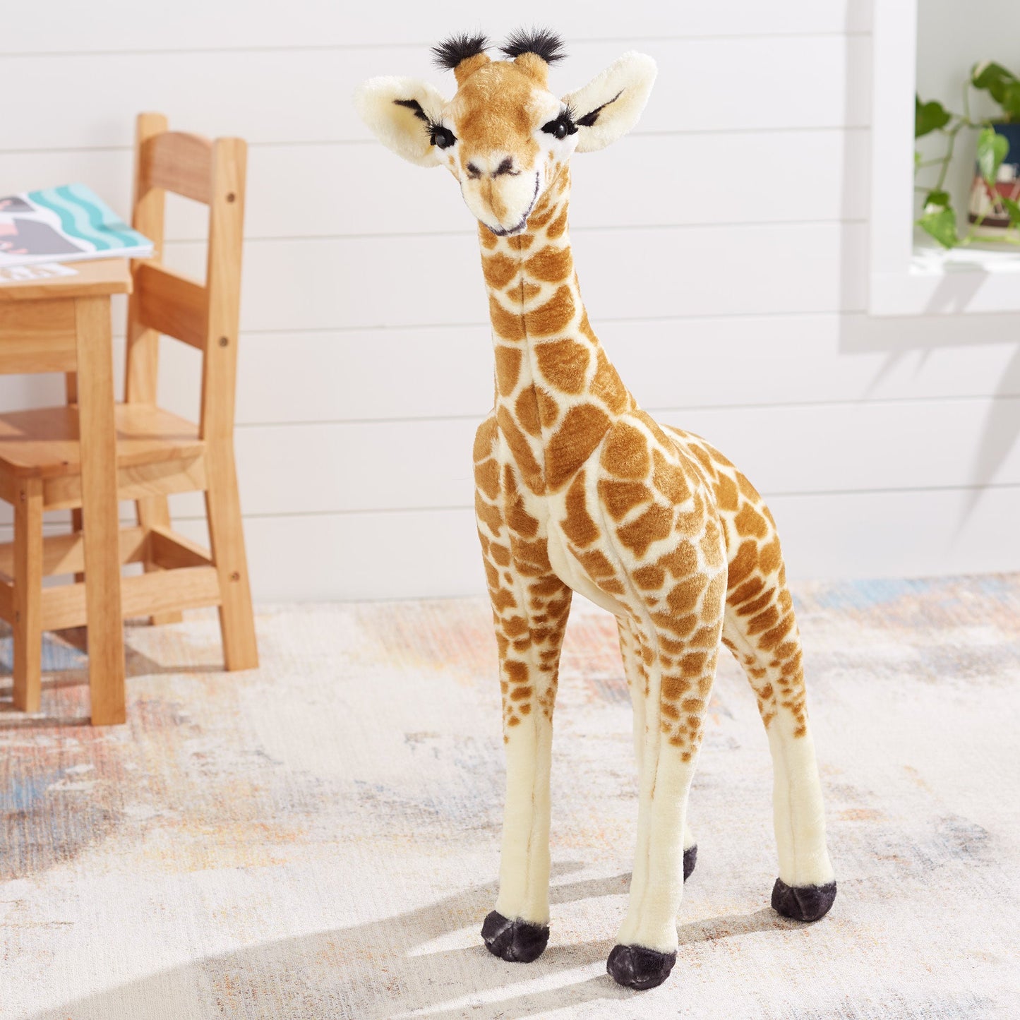 Levensechte pluchen babygiraf