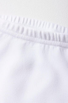 Białe legginsy